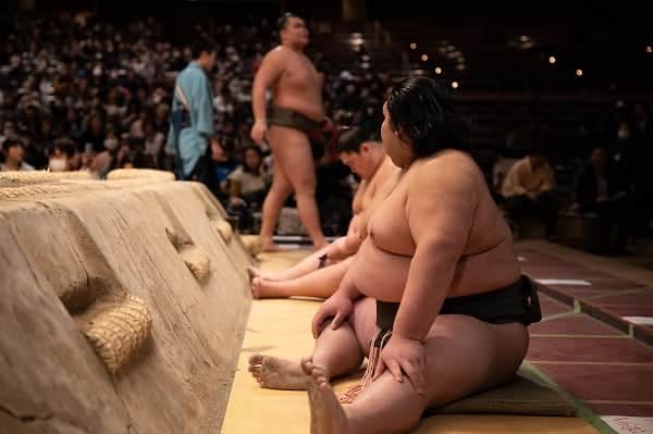 Sumo wrestlers warming up