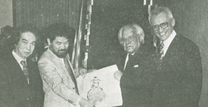 Artist Toshio Iino and Maeda Ryo prent print to Cuban poet Nicolas Guillen with Charge d'Affaires Eduoardo Balbin Martin.