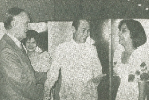 U.S. Ambassador Mike Mansfield congratulating Philippine Ambassador Carlos J. Valdes and his daughter, Georgina with Minister Ophelia Gonzales.