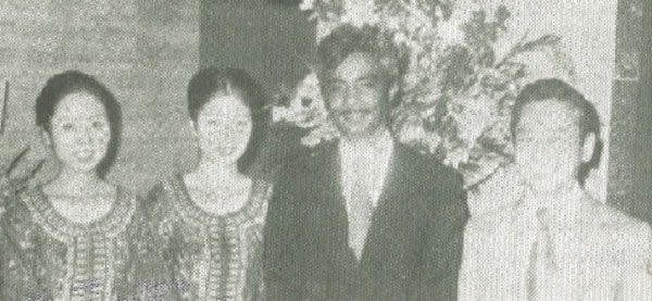 J.E. Jesudason and Teruo Matsuda of Singapore Airlines with two of the flight attendants at the Singaore party.