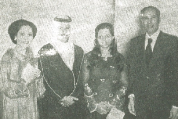 Dewi Sukarno and Egyptian Ambassador Mohsen Khalek (right) congratualte Qatari Ambassador and Mme. Hamad Mansour Al-Hajiri on their country's National Day.