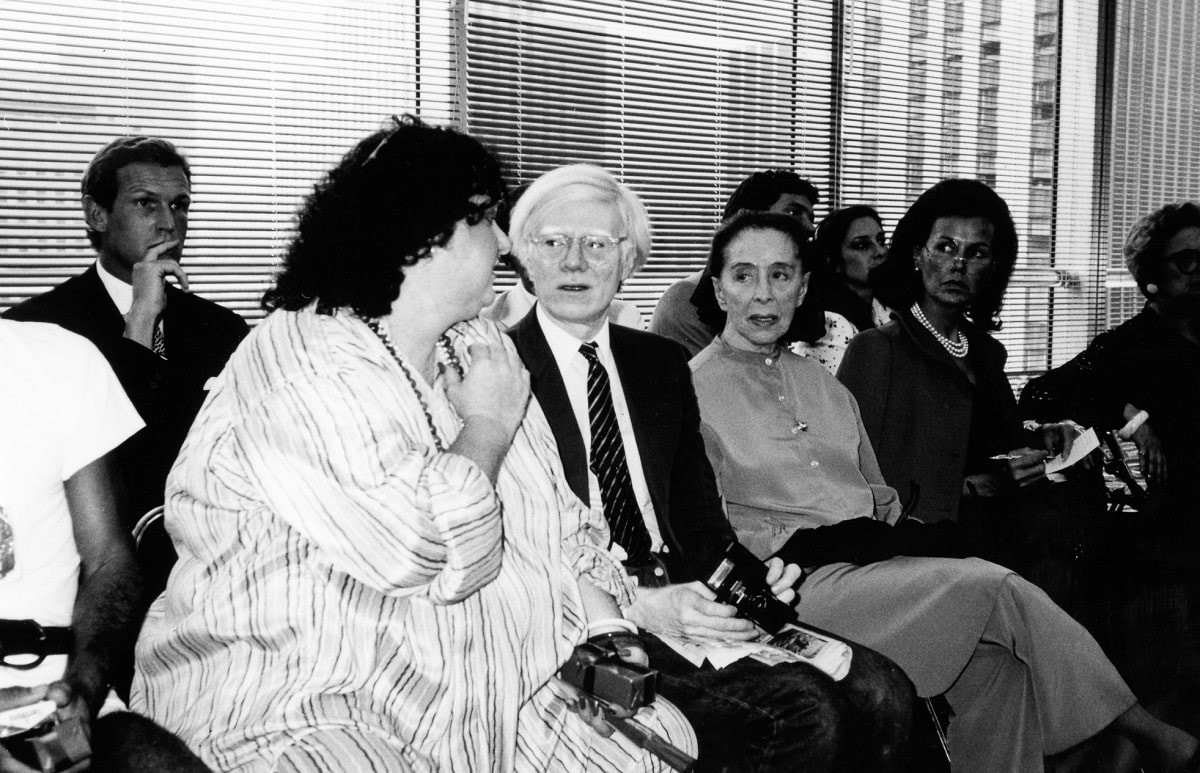Film actress Pat Ast, pop-art guru Andy Warhol and all-time dance great Martha Graham at the Halston fashion showing.