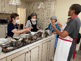 Cooking class by the wife of Ambassador Extraordinary and Plenipotentiary of Zimbabwe, Mrs. Nompumelelo Abu-Basutu.