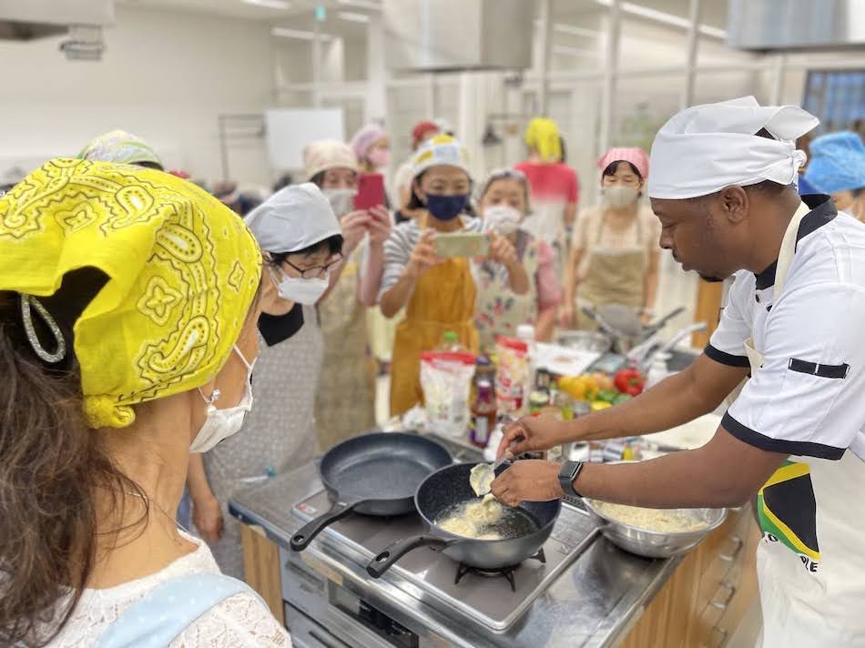 Participants looking serious to learn how Jamaican chef cooks.