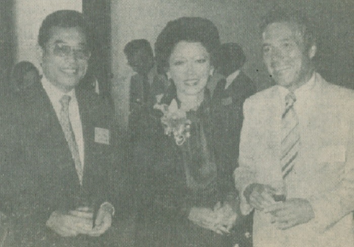 Jean Ariyoshi, dynamic wife of Hawaii's Gov. George Ariyoshi, is flanked by Baron Yoshii, director of Tokyo Sales of Hilton International, and Bruce (Bud) Smith, Sales and Marketing Manager of Northwest Oriente Airlines.