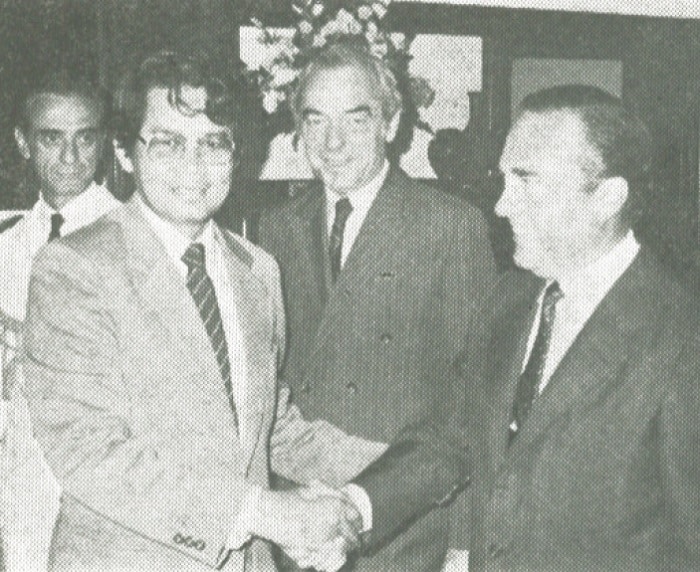 Newly arrived Malaysian Ambassador A.B. Jamaluddin congratulates Argentine Ambassador Gabriel Oliva as Argentine Minister Garcia Jiminez (center) and Agentine Military Attaché Capt. Euardo Dachequi look on