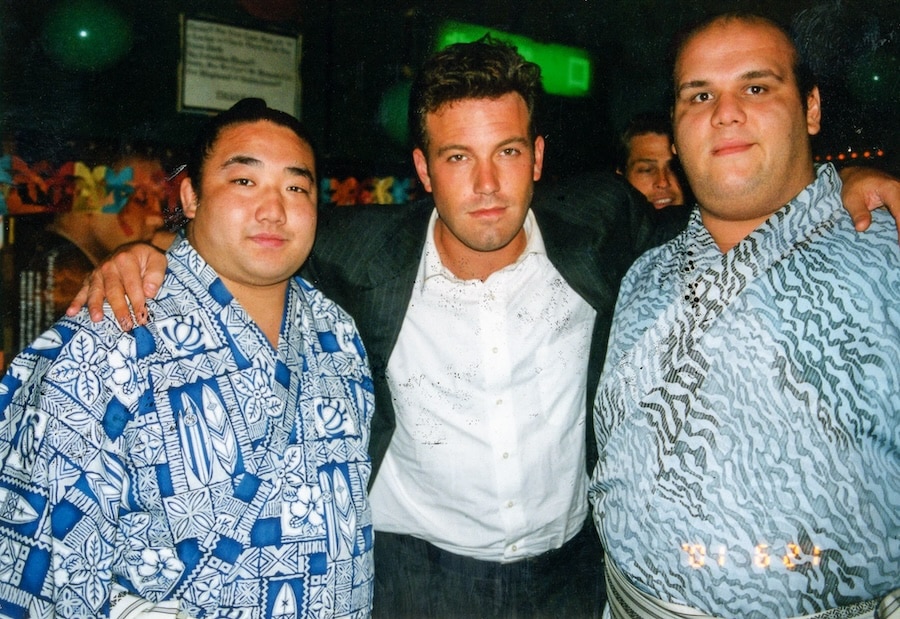Ben Affleck with two sumo wrestlers at Lexington Queen.