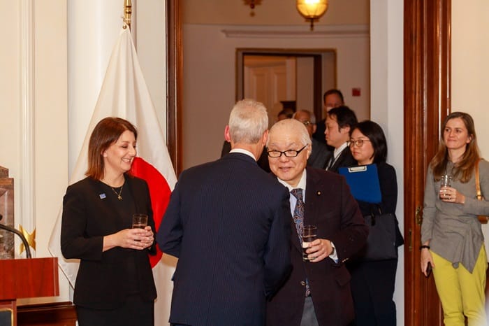 Japan Minister of Health, Labour and Welfare Keizo Takemi greeted by U.S. Ambassador Emanuel.