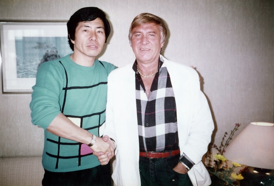 Sho Kosugi and Bill hersey shaking hands
