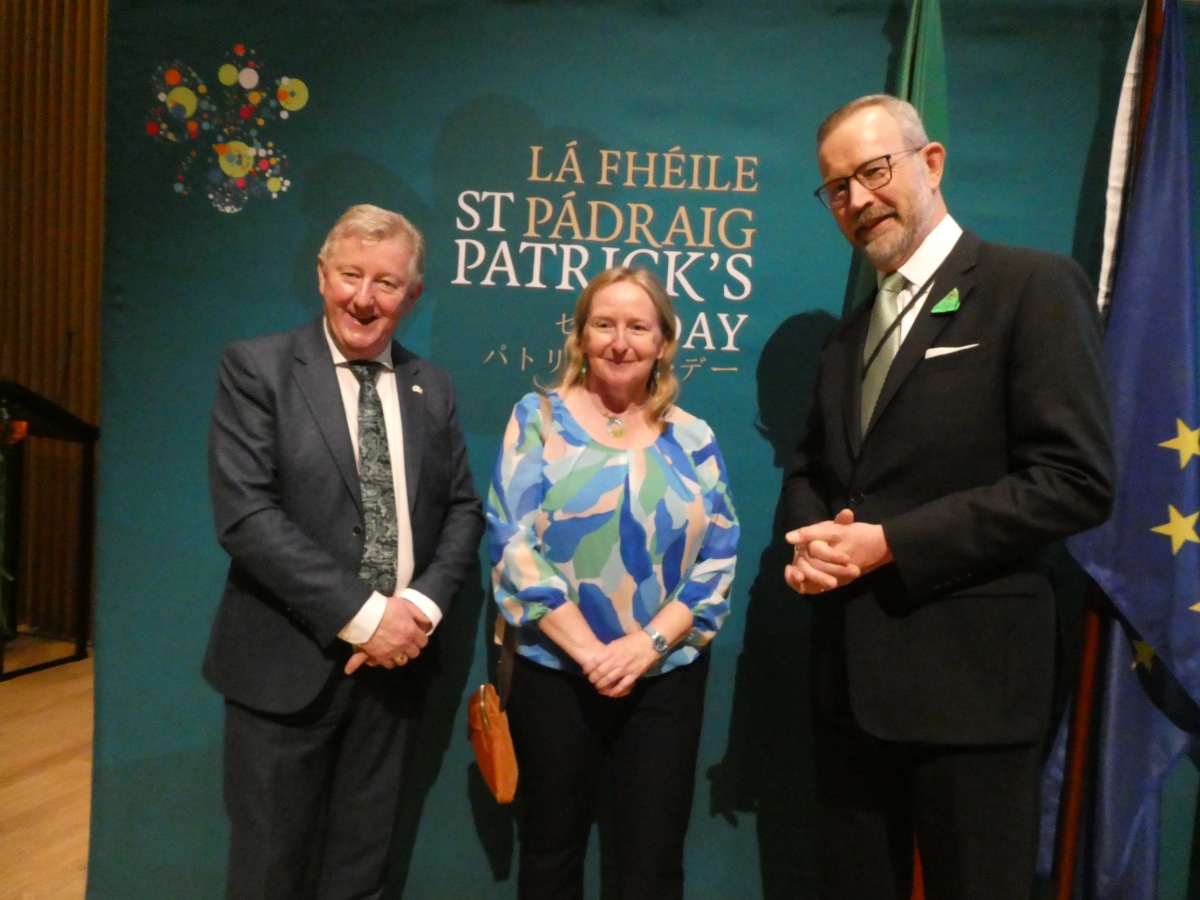 Minister Sean Canney and Ambassador Damien Cole posing with a guest at the conclusion of the St. Patrick's Day celebration in Tokyo.