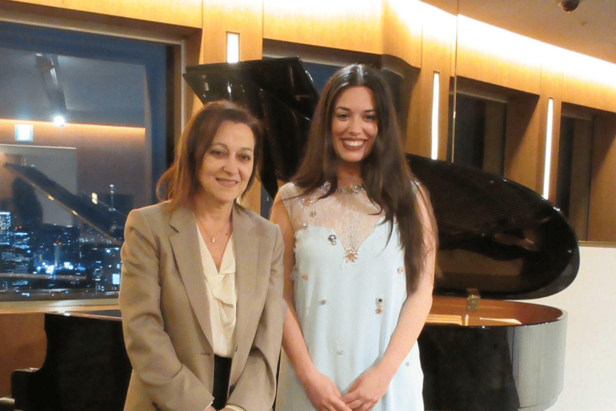 Greek Ambassador Olga Kliamaki and Greek diva Ada Athanasopoulou standing together in Tokyo.
