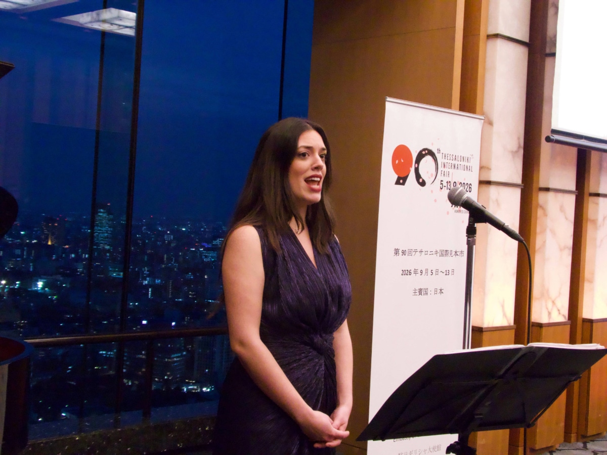 Soprano Ada Athanasopoulou performing the Japanese song "Ito" for the guests.