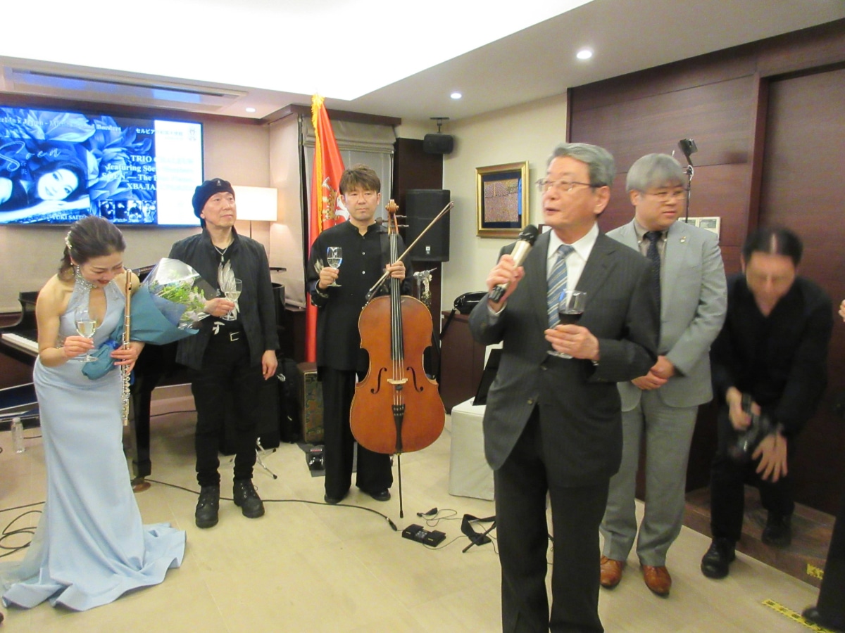 Guests and performers sharing a toast at the conclusion of the Serbian music event at the Embassy in Japan.