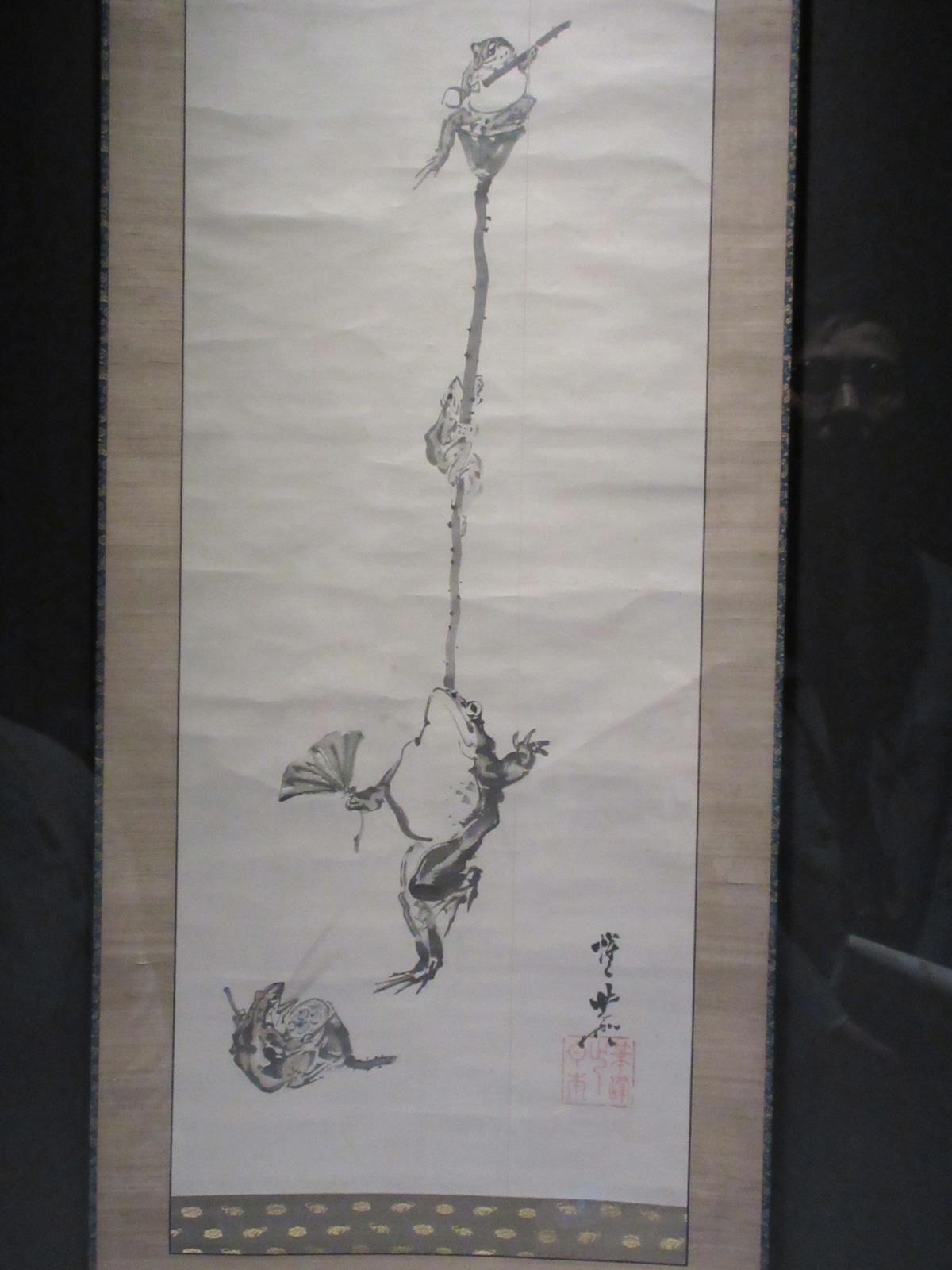 Kawanabe Kyōsai ink scroll of frogs in theatrical poses climbing a tall pole, exemplifying his expressive animal paintings in the Beasts chapter