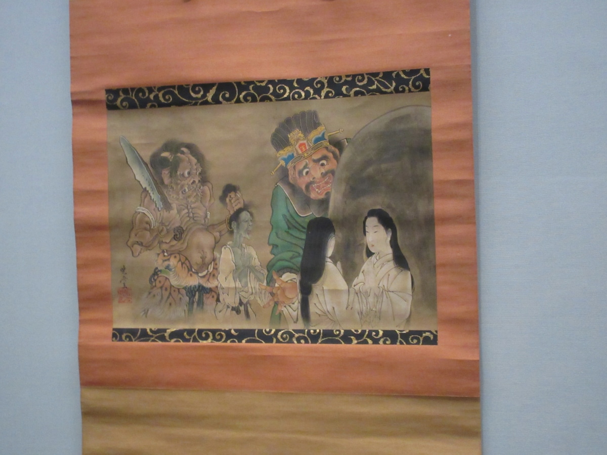 Kawanabe Kyōsai scroll painting of a crowned oni king surrounded by ghosts and souls, featured in the Demon chapter of the Israel Goldman Collection exhibition