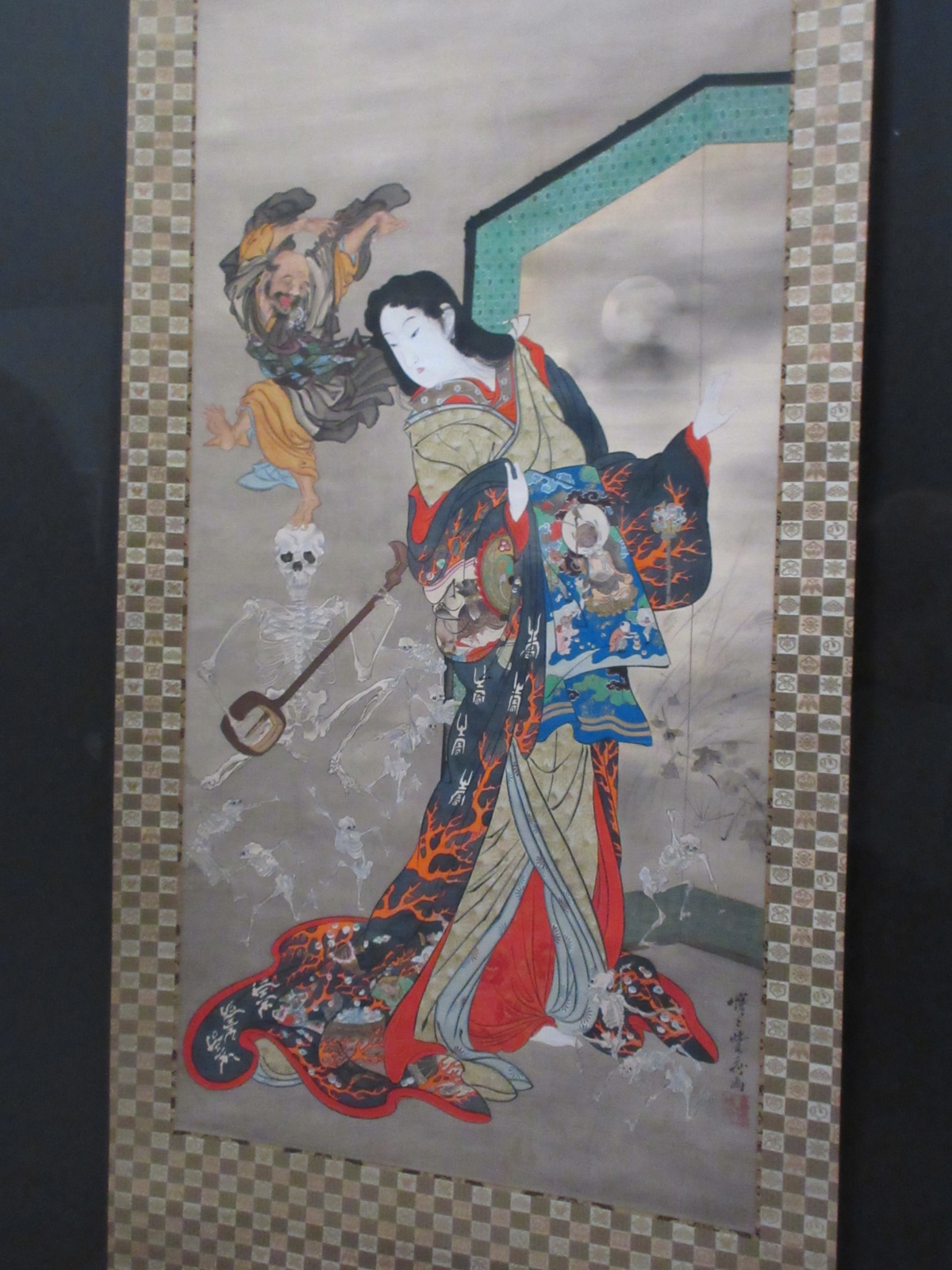Kawanabe Kyōsai hanging scroll depicting a woman in ornate kimono with supernatural figures, from the Divine chapter of the Israel Goldman Collection exhibition