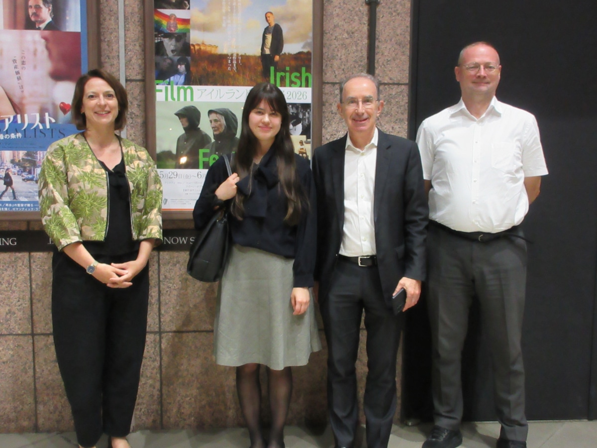 Group photo of attendees in front of the Irish Film Festival 2026 poster display at Yebisu Garden Cinema, Tokyo
