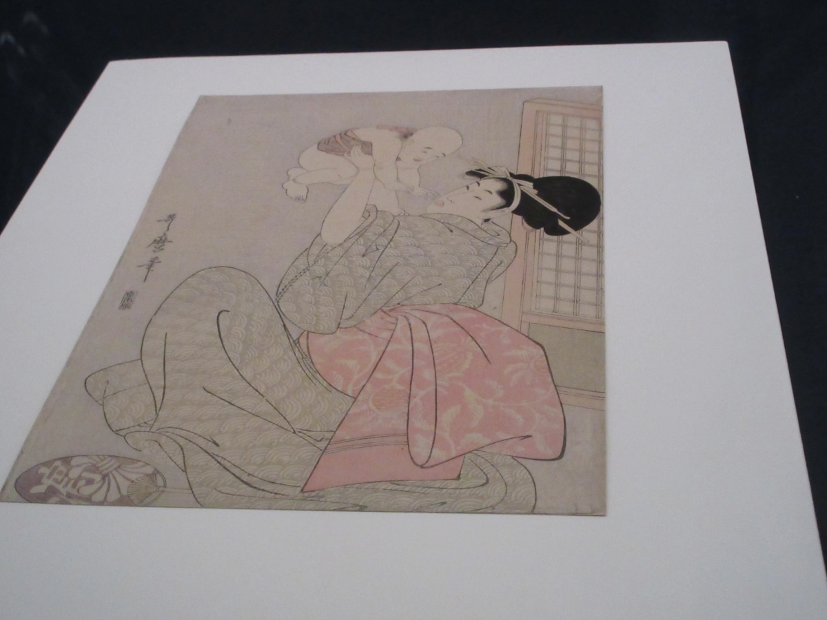 Edo-period ukiyo-e print of a woman in kimono holding a child, from the Royal Museums of Art and History, Belgium