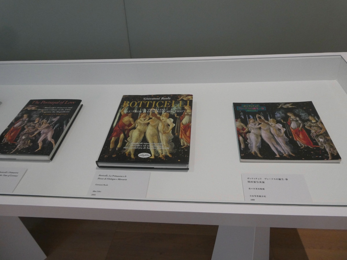 Reference books on Botticelli's Primavera on display