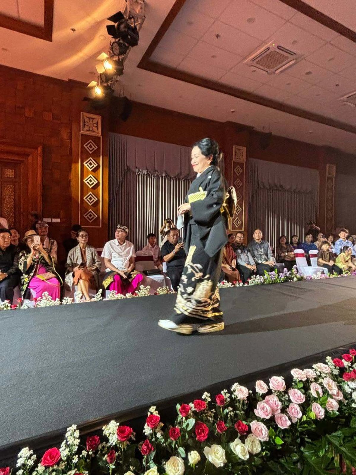 Traditional black and gold kimono showcased at Bali Arts Festival 2026 fashion show