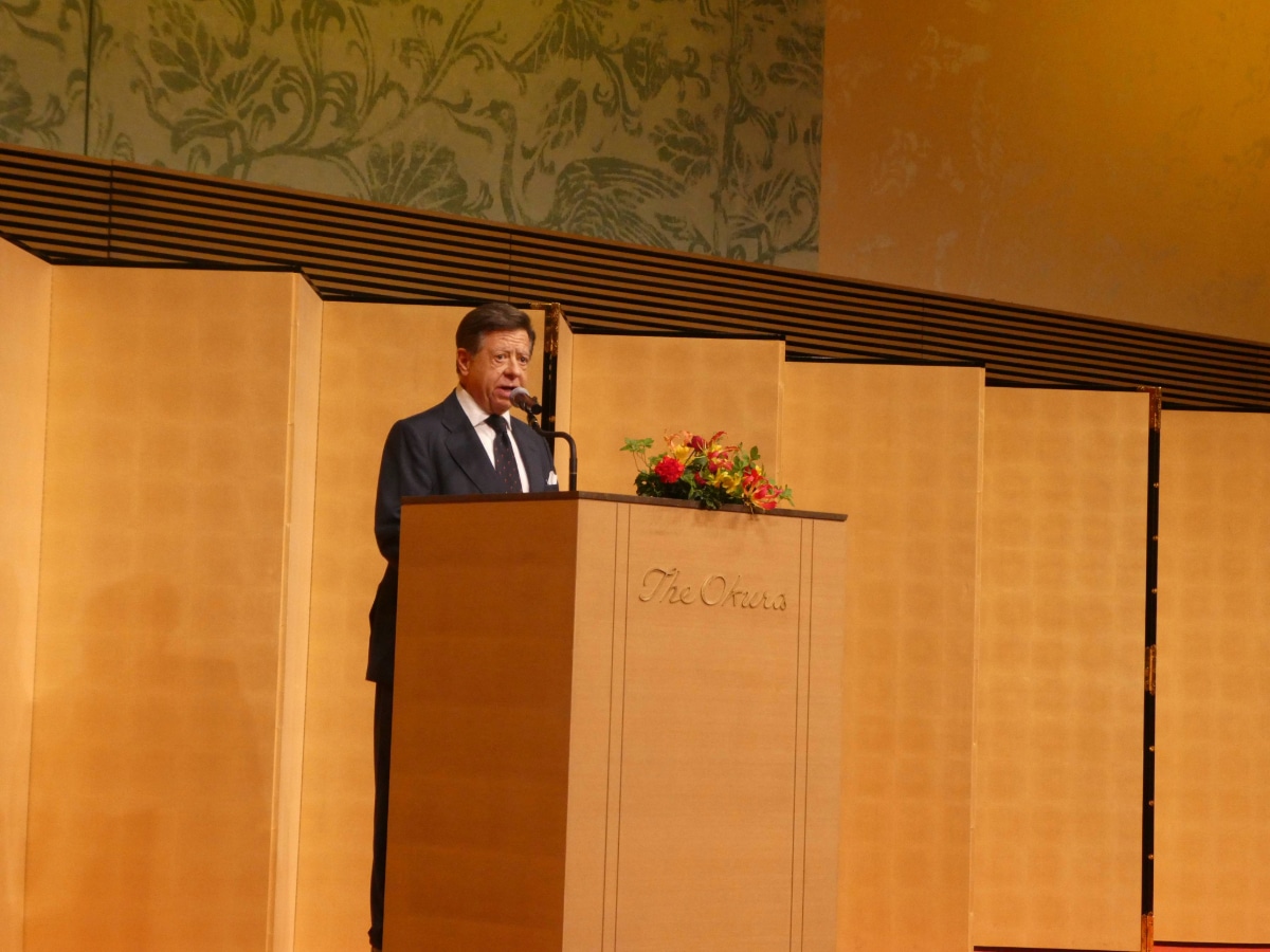 Speaker delivering a message at the podium during the Embassy of Spain’s National Day reception in Japan